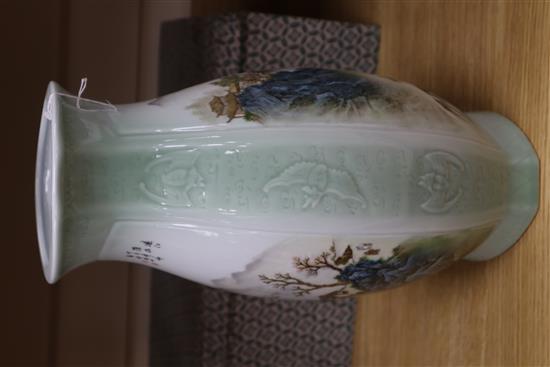 A Chinese celadon ground vase decorated with landscapes H. 34cm